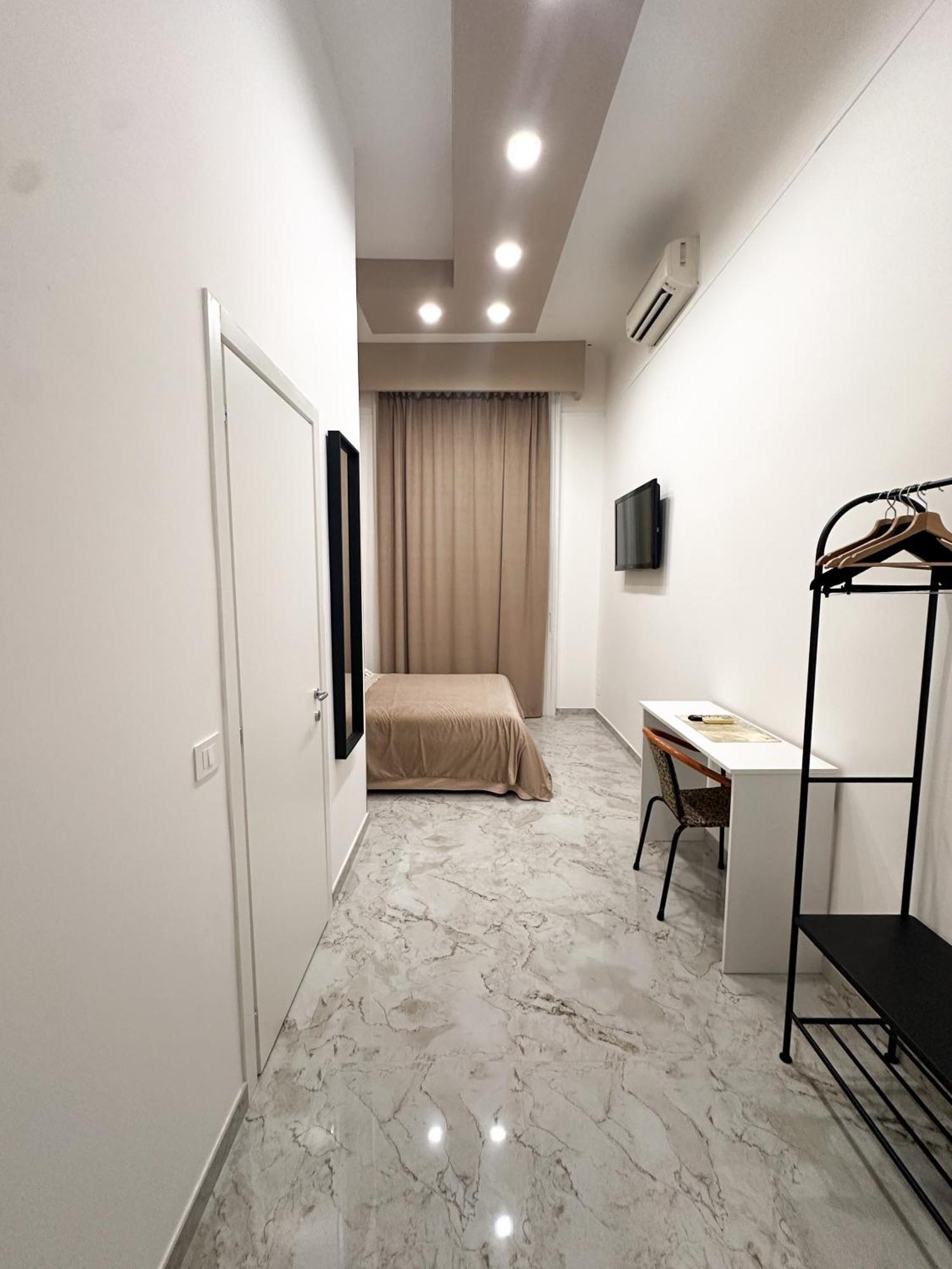 Benvenuto A Couette-café Naples